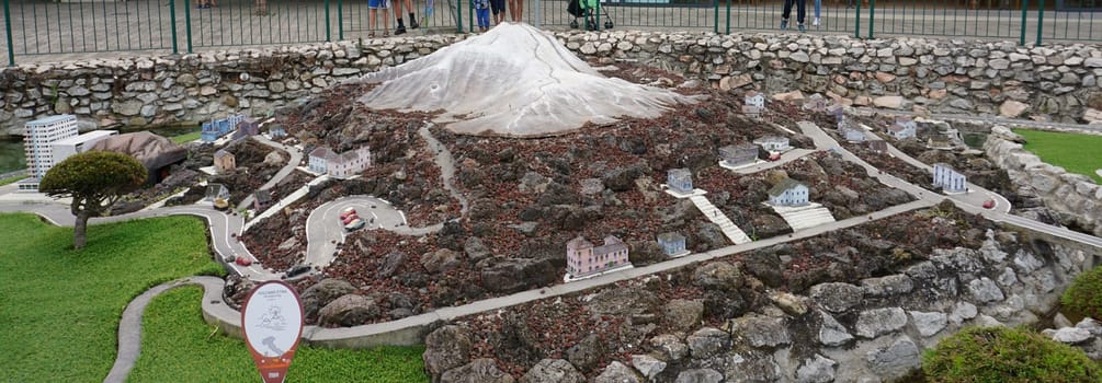 Viserba, Italy - June 25, 2024: People going at Theme park Italy in Miniature or Italia in Miniatura in Rimini, Italy - Reproduction of famous attractions in a small scale