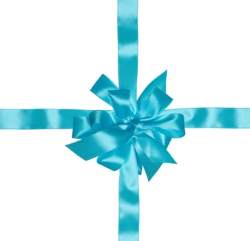 Blue ribbon with a cross and a bow on an isolated backgroun, top view