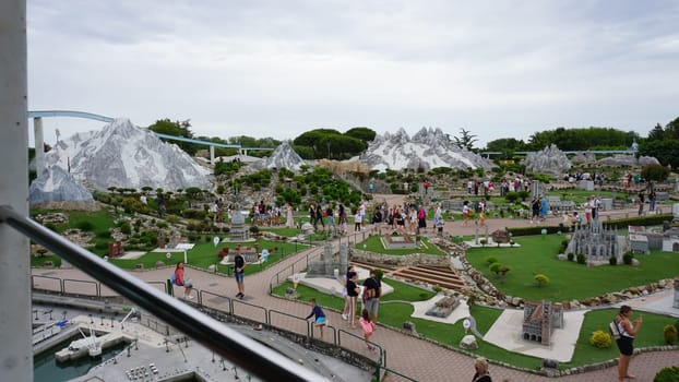 Viserba, Italy - June 25, 2024: People going at Theme park Italy in Miniature or Italia in Miniatura in Rimini, Italy - Reproduction of famous attractions in a small scale