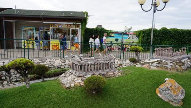 Viserba, Italy - June 25, 2024: People going at Theme park Italy in Miniature or Italia in Miniatura in Rimini, Italy - Reproduction of famous attractions in a small scale