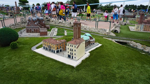 Viserba, Italy - June 25, 2024: People going at Theme park Italy in Miniature or Italia in Miniatura in Rimini, Italy - Reproduction of famous attractions in a small scale