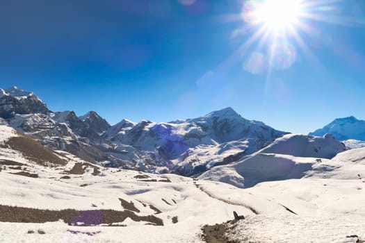 View onto the trail from Thorung, Thorong High Camp to the Thorong, Thorang, Thorung La Pass, running through a snow covered landscape, Annapurna Circuit Trek, Nepal 2022
