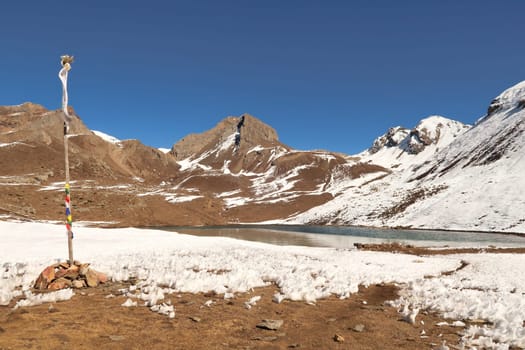 The Ice Lake, Kicho Tal, Khicho Ice Lake on a sunny day, close to Manang, Annapurna Circuit Trek, Nepal 2022