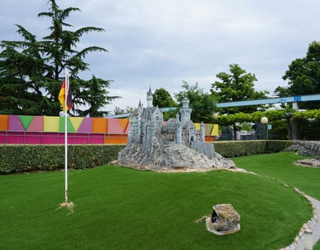 Viserba, Italy - June 25, 2024: Neuschwanstein castle at Theme park Italy in Miniature or Italia in Miniatura in Rimini, Italy - Reproduction of famous attractions in a small scale