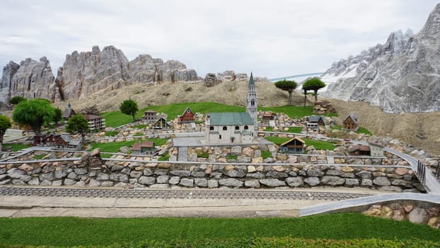 Viserba, Italy - June 25, 2024: Alps at Theme park Italy in Miniature or Italia in Miniatura in Rimini, Italy - Reproduction of famous attractions in a small scale