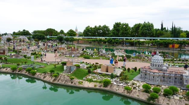 Viserba, Italy - June 25, 2024: People going at Theme park Italy in Miniature or Italia in Miniatura in Rimini, Italy - Reproduction of famous attractions in a small scale