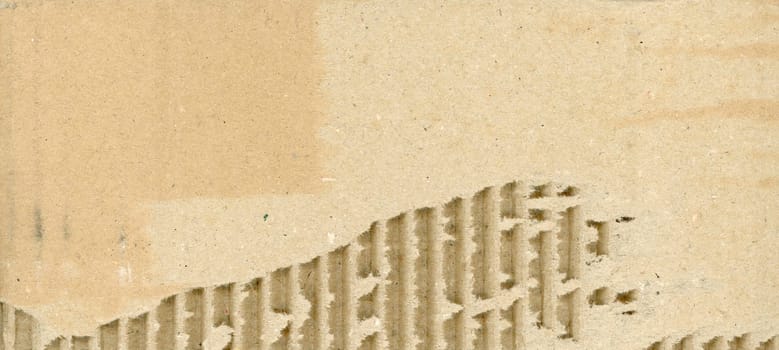 brown corrugated cardboard texture useful as a background