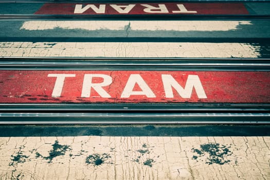 View on pedestrian crossing of a tram rail bed