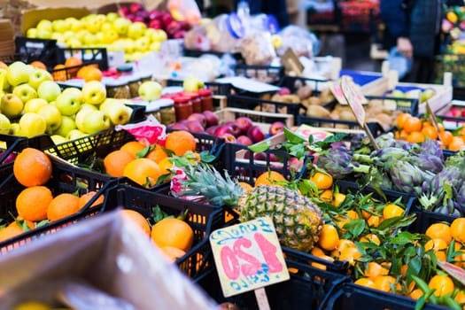 Open air market in Italy, different fruit. Madeira's fruits, a pineapple lemon orange