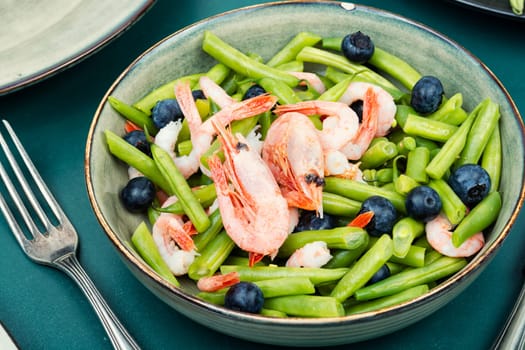 Prawns salad, salad with shrimp and green beans or cowpeas. Copy space. Space for text.