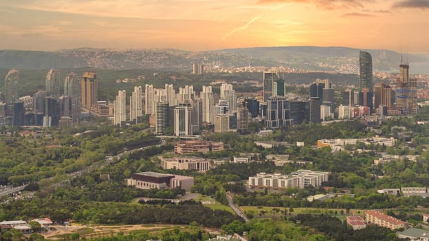 An aerial view of Istanbul's cityscape with skyscrapers and green spaces, taken from a Istanbul Sapphire skyscraper during a sunset, Turkey