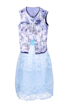 Women summer clothes. Close-up of a light turquoise stylish evening dress with lace and a blue jeans vest or jacket for woman on mannequin isolated. Jeans fashion.