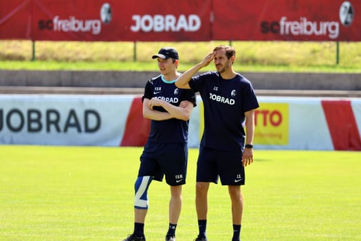 Head coach Julian Schuster (SC Freiburg) and assistant coach Franz-Georg Wieland watch the action on the training ground at the SC Freiburg Schruns 2024 training camp  DFL REGULATIONS PROHIBIT ANY USE OF PHOTOGRAPHS AS IMAGE SEQUENCES AND/OR QUASI-VIDEONann  Photo: Joachim Hahne/johapress