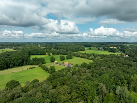 aerial view of a dutch farmhouse in a green surroundings