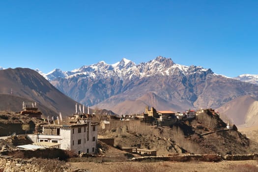 View onto the traditional village of Jharkot in front of high mountain range, close to Muktinath, Ranipauwa, Annapurna Circuit Trek, Nepal 2022
