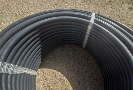 Roll of tubing for autocompensating drippers. Overhead view