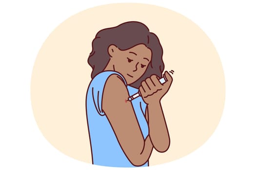 Woman injects diabetic insulin into arm to relieve pain associated with excess blood sugar. Young girl uses insulin medicine to fight diabetes or viral illness caused by infectious flu.