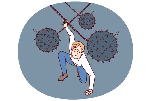 Brave man dodges prickly balls suspended from chain, symbolizing business problems and obstacles to success. Guy demonstrates leadership qualities by overcoming problems and adapting to situation