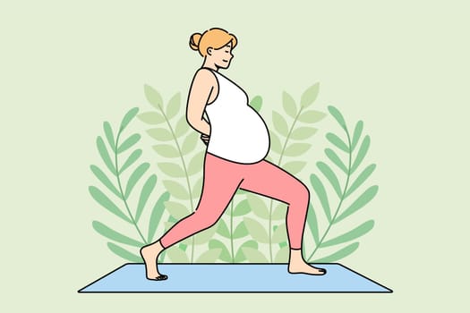Pregnant woman does yoga on fitness mat, taking care of health of herself and unborn child. Pregnant girl is preparing to become mother by practicing yoga and pilates to support immune system.