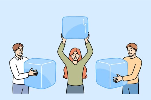 Ice cubes in hands of people who want to cool off and drink cold drinks in summer sunny weather. Happy men and woman with huge ice cubes for alcoholic cocktails or delicious natural juices