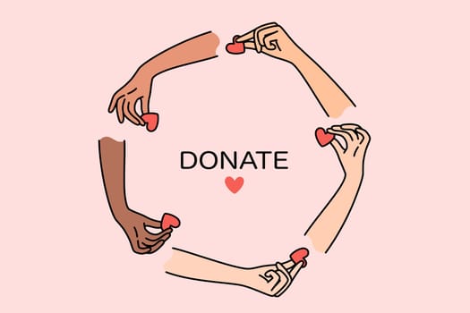 Donate from kind people holding hearts in hands, metaphor for donating money to charitable foundation. Help and donate of blood or organs to save patients are victims of illness or accident