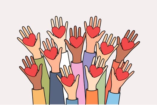 People from charitable foundation hold hearts symbolizing unity in fight for sustainable future for planet. Concept of importance of charity and mercy to help those in need of protection