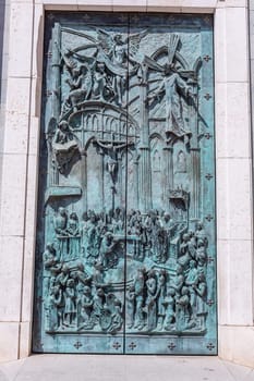 Madrid, Spain: April 24, 2024: Door detail of the Almudena Cathedral in Madrid, Spain