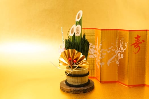 Kadomatsu and gold folding screen of the image (New Years card materials and New Year material). Shooting Location: Yokohama-city kanagawa prefecture