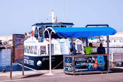 Gran Canaria, Spain, Canary Islands, Puerto Rico - Jul 17, 2024. A Ferry of Safari III Blue Bird in the harbour of Puerto Rico. Direction Anfi del Mar, Arguineguin and Mogan.
