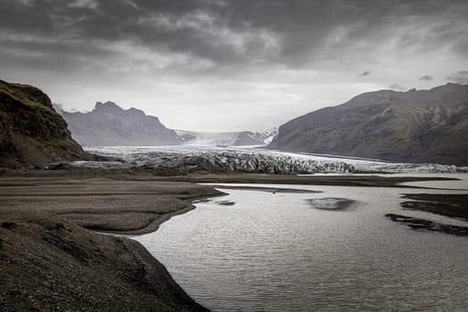 Vatnajokull glacier under cloudy sky Iceland background