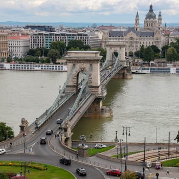 Skyline of Budapest, Hungary. View over the Szechenyi Chain Bridge and the River Danube towards St Stephens Basilica.