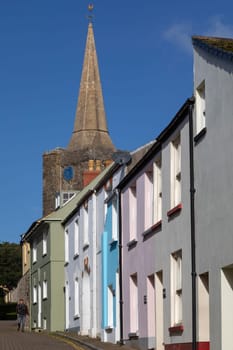 Colorful houses near St Mary's Church in the coastal town of Tenby in Pembeokeshire, Wales.