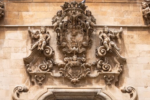 Martina Franca, Italy, Apulia - May 25, 2024: Decorative facade of baroque Church of Saint Dominic (Chiesa San Domenico)