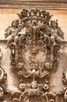 Martina Franca, Italy, Apulia - May 25, 2024: Decorative facade of baroque Church of Saint Dominic (Chiesa San Domenico)