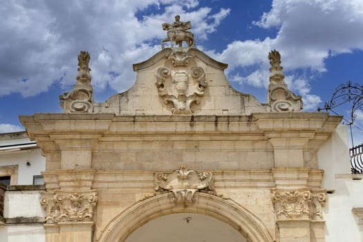 Martina Franca, Italy, Puglia - May 25, 2024: Medieval St. Stephen's Gate (Porta di Santo Stefano), baroque gate to old Town. It is located between Piazza XX Settembre and Piazza Roma