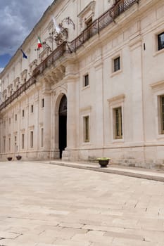 Martina Franca, Italy, Puglia - May 20, 2024: Facade of Palazzo Ducale, located at Piazza Rome next to St. Stephen's Gate (Porta di Santo Stefano)
