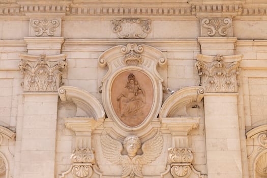Martina Franca, Italy, Apulia - May 25, 2024: Decorative facade of Church of the Madonna del Carmine (Chiesa Parrocchiale della Madonna del Carmine)