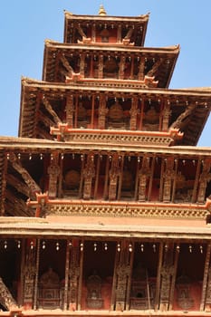 The roof construction of the Nyatapola Temple, decorated with elaborate wood carvings in the old town Bhaktapur, Nepal 2022