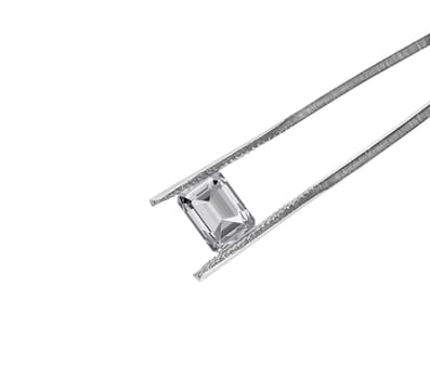 Cut Beautiful diamond held by tweezers on white background
