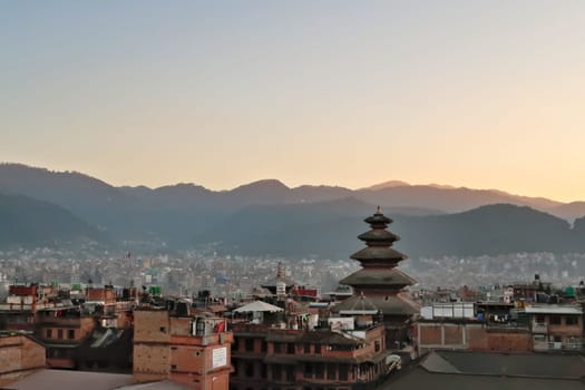 Skyline, cityscape of Bhaktapur at sunset, the Nyatapola Temple in the foreground, Bhaktapur, Nepal 2022