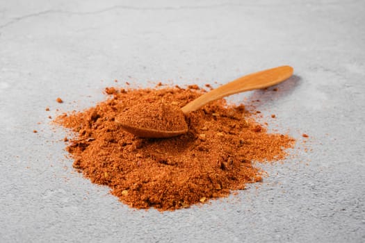 Traditional Georgian seasoning - dry adjika on concrete background