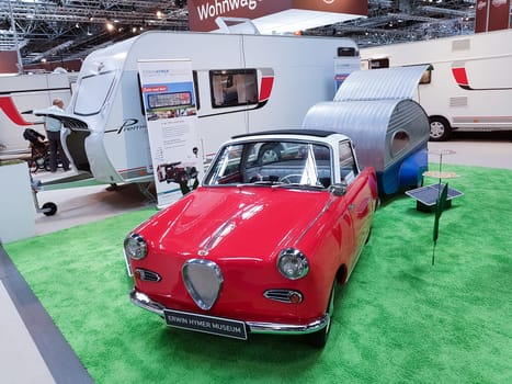 DUESSELDORF, NRW, GERMANY - AUGUST 29, 2018: Motorhomes and campers for sale or rent at an exhibition. Concept freedom, family vacation trip, holiday trip with camper.