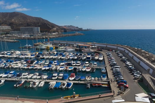 CRAN CANARIA, PUERTO RICO - NOVEMBER 16, 2019: Marina in Puerto Rico de Gran Canaria. Postcard, spain.