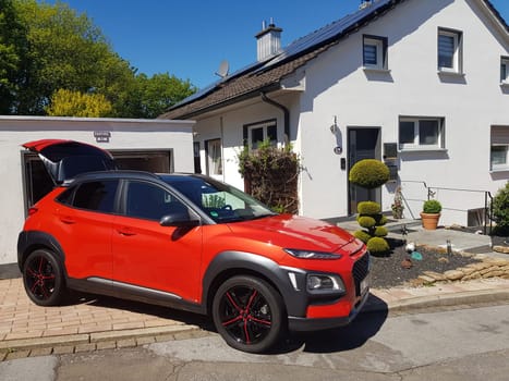 VELBERT, NRW, GERMANY - MAY 05, 2020: Hyundai Kona small SUV car, with new aluminum rims with red stripes