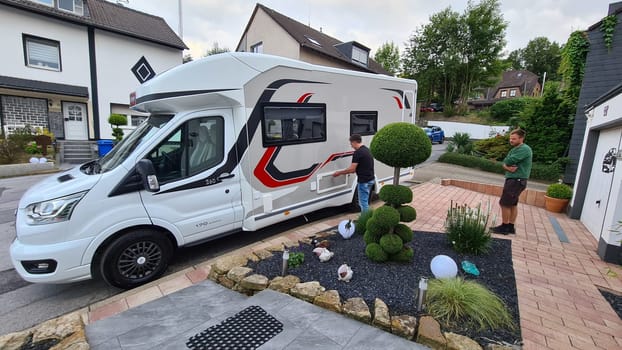 HEILIGENHAUS, NRW, GERMANY - JULY 31, 2021: Motorhomes and campers for sale or rent. Concept freedom, family holiday travel, vacation travel with camper.