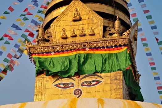 The face painted on the golden top of the Swayambhunath Stupa, Temple, Kathmandu, Nepal 2022