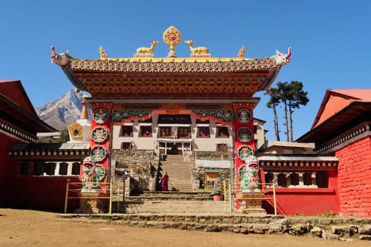 The elaborate colorful entrance gate to the tibetan buddhist monastery of Tengboche, Tangboche village, Mount Everest Base Camp Trek, EBC, Nepal 2022