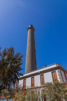 Gran Canaria, Spain: March 20, 2024: People at the Maspalomas Lighthouse in Gran Canaria Canary Island.This highest lighthouse on the island,a landmark in this important tourist destination