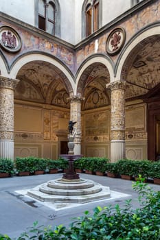 Interior courtyard in the Palazzo Vecchio (Old Palace) is the town hall of the city of Florence, Italy. It overlooks the Piazza della Signoria with its copy of Michelangelo's David statue. The historic center of Florence (Firenze) is a UNESCO World Heritage Site.