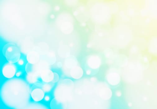 Abstract blurred fresh vivid spring summer light delicate pastel turquoise yellow bokeh background texture with bright circular soft color lights. Card concept. Beautiful backdrop illustration.